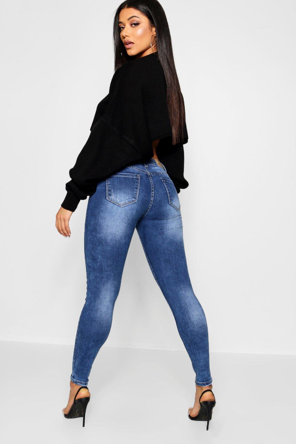 Lace Up Front Mid Rise Skinny Jeans